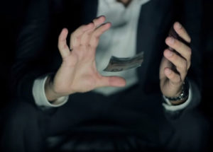 comedy magician Andrew Kinakin floating bill